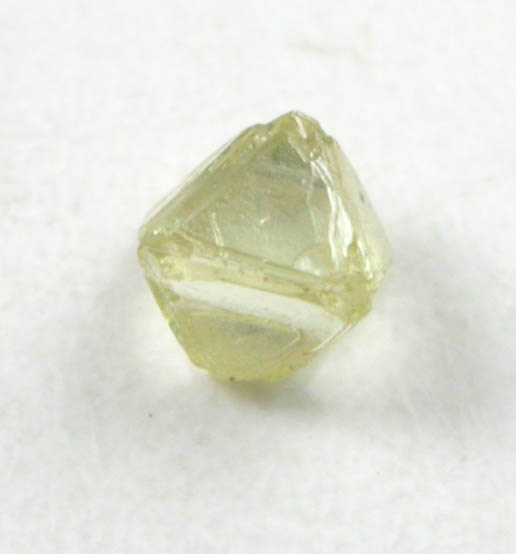 Diamond (0.05 carat yellow octahedral crystal) from Fuxian, Lianing Province, China
