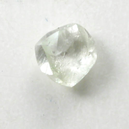Diamond (0.05 carat pale-yellow dodecahedral crystal) from Fuxian, Lianing Province, China
