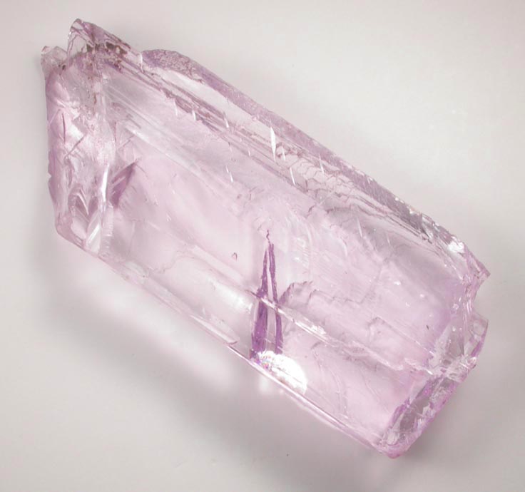 Spodumene var. Kunzite gem-grade flawless crystal from Lavra do Urucum, Conselheiro Pena, 4 km east of  Galilia, Minas Gerais, Brazil