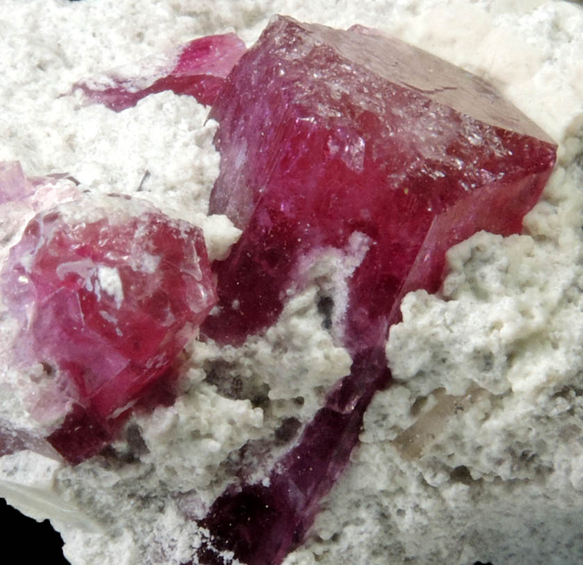 Beryl var. Bixbite (Red Beryl) from Rex Harris' Ruby Violet claim, 1 km north of Bumblebee Mountain, Wah Wah Mountains, Beaver County, Utah