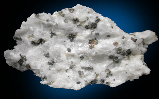 Periclase with Brucite alteration rims from Crestmore Quarry, 440 Level, 1620 North, Riverside County, California