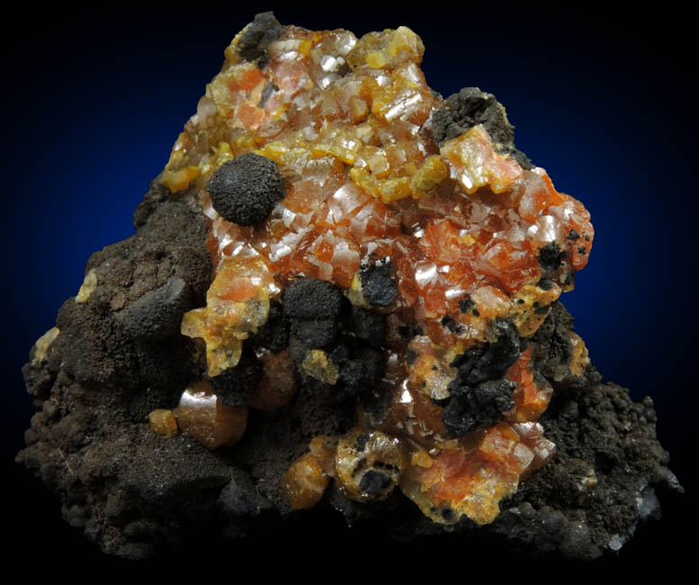 Mimetite var. Campylite on Psilomelane from Drygill Mine, Caldbeck Fells, Cumbria, England