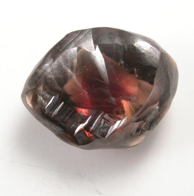 Diamond (1.22 carat red-brown flattened dodecahedral crystal) from Majhgawan Pipe, near Panna, Madhya Pradesh, India