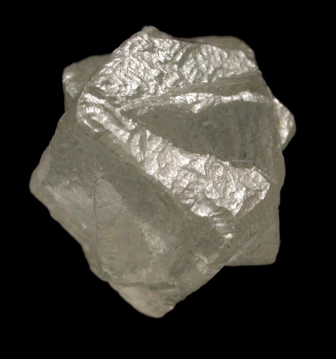 Diamond (5.71 carat pale-yellow interpenetrant-twinned cubic crystals) from Mbuji-Mayi (Miba), 300 km east of Tshikapa, Democratic Republic of the Congo