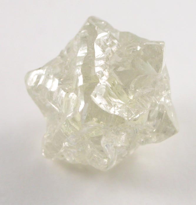 Diamond (1.35 carat yellow Star-of-David twinned crystals) from Magna Egoli Mine, Zimmi property along the Sewa River, Sierra Leone