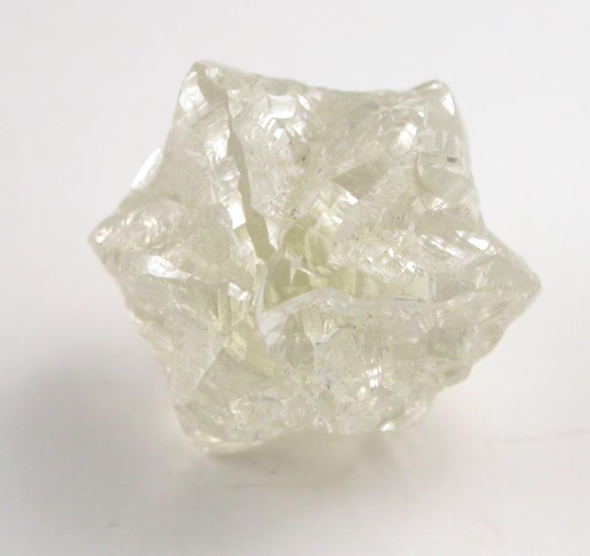 Diamond (1.35 carat yellow Star-of-David twinned crystals) from Magna Egoli Mine, Zimmi property along the Sewa River, Sierra Leone