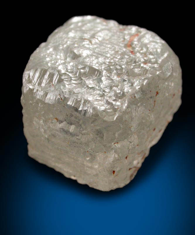 Diamond (5.10 carat pale-yellow distorted cubic crystal) from Magna Egoli Mine, Zimmi property along the Sewa River, Sierra Leone