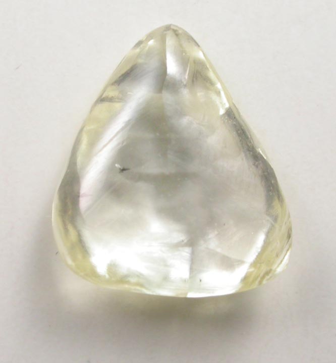 Diamond (0.69 carat cuttable yellow flattened triangular crystal) from Sakha (Yakutia) Republic, Siberia, Russia