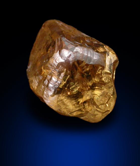 Diamond (0.95 carat cuttable fancy-orange irregular crystal) from Almazy Anabara Mine, Republic of Sakha, Siberia, Russia