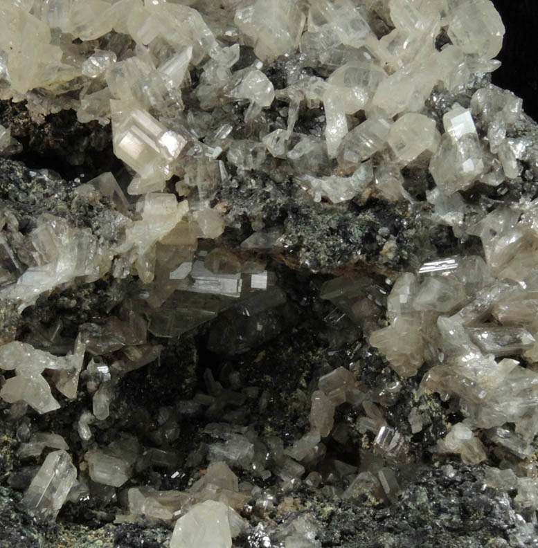 Cerussite (twinned crystals) on Galena with Oxyplumboromite from Touissit Mine, 21 km SSE of Oujda, Jerada Province, Oriental, Morocco