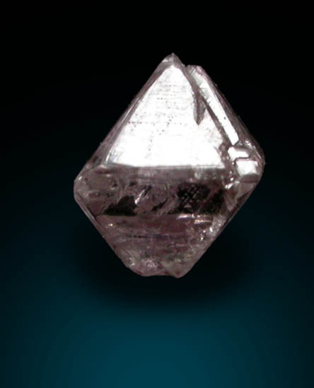 Diamond (0.22 carat pale pink-brown octahedral crystal) from Argyle Mine, Kimberley, Western Australia, Australia