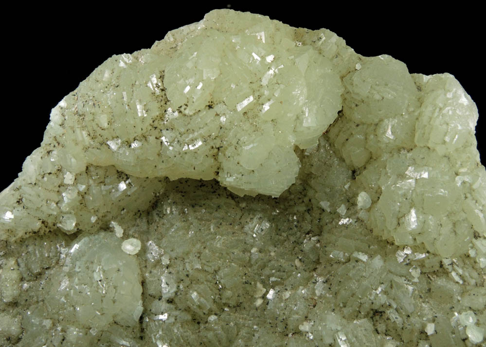 Prehnite with pseudomorphic molds after Laumontite from Lower New Street Quarry, Paterson, Passaic County, New Jersey