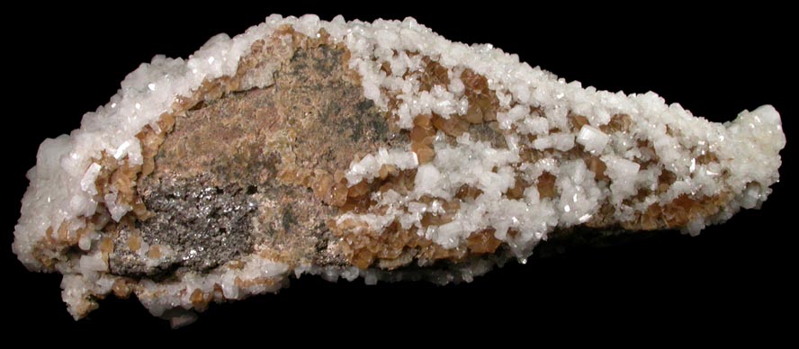 Harmotome (twinned crystals) on Calcite from Clashgorm Mine, Strontian, North West Highlands, Scotland