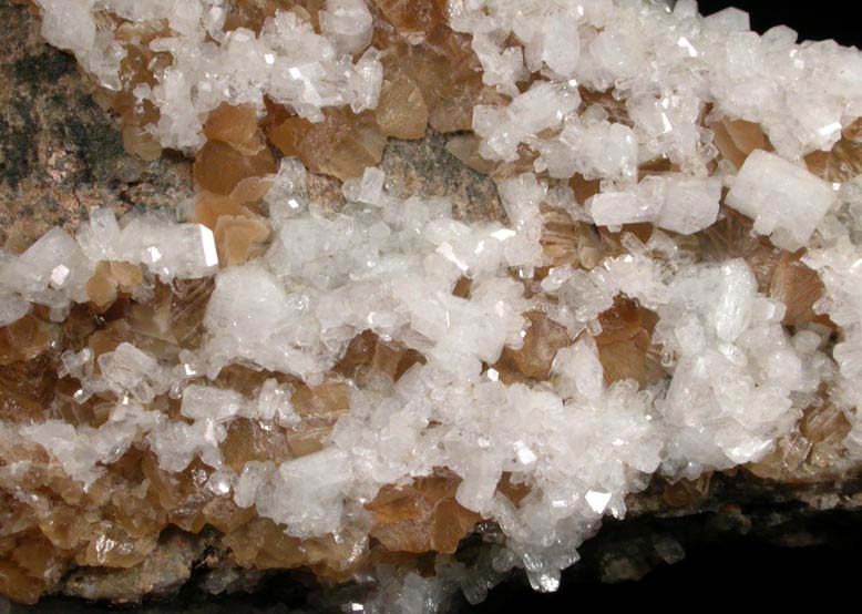Harmotome (twinned crystals) on Calcite from Clashgorm Mine, Strontian, North West Highlands, Scotland