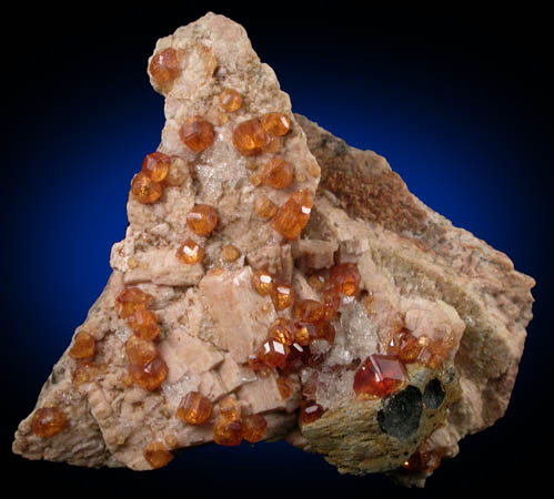 Spessartine Garnet and Hyalite opal on Microcline from Tongbei-Yunling District, Fujian Province, China