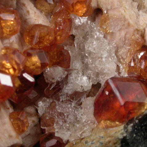 Spessartine Garnet and Hyalite opal on Microcline from Tongbei-Yunling District, Fujian Province, China