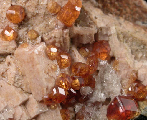 Spessartine Garnet and Hyalite opal on Microcline from Tongbei-Yunling District, Fujian Province, China