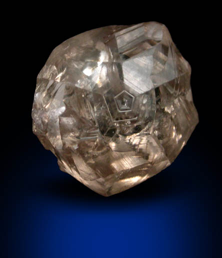 Diamond (1.33 carat sherry-colored flattened twinned crystal) from Jwaneng Mine, Naledi River Valley, Botswana