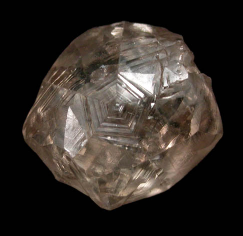 Diamond (1.33 carat sherry-colored flattened twinned crystal) from Jwaneng Mine, Naledi River Valley, Botswana