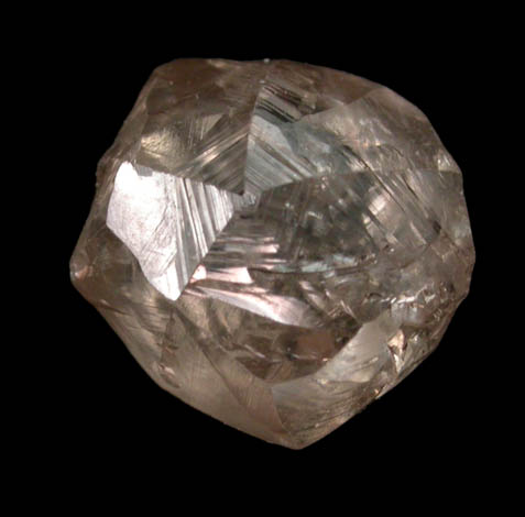 Diamond (1.33 carat sherry-colored flattened twinned crystal) from Jwaneng Mine, Naledi River Valley, Botswana