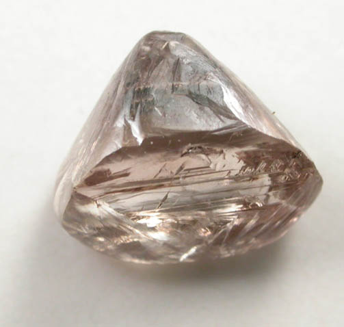 Diamond (1.48 carat sherry-colored distorted octahedral crystal) from Jwaneng Mine, Naledi River Valley, Botswana