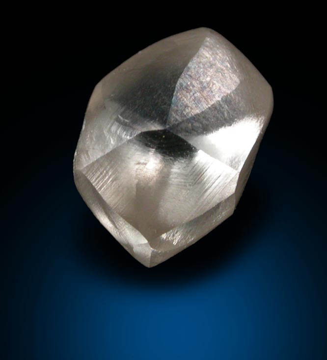 Diamond (1.40 carat champagne-colored distorted cuttable dodecahedral crystal) from Damtshaa Mine, near Orapa, Botswana