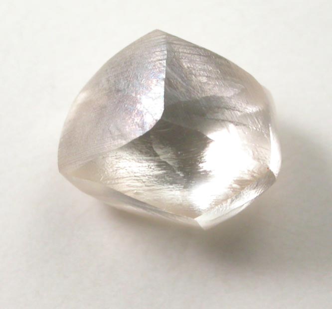 Diamond (1.40 carat champagne-colored distorted cuttable dodecahedral crystal) from Damtshaa Mine, near Orapa, Botswana