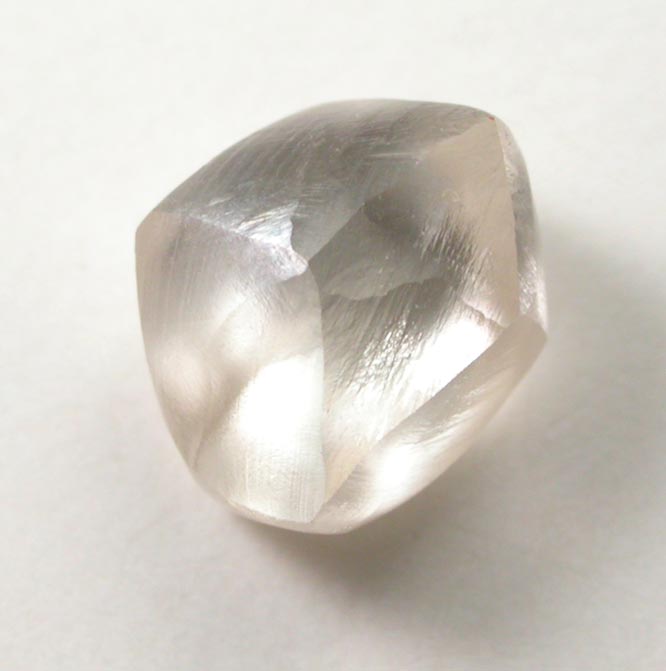 Diamond (1.40 carat champagne-colored distorted cuttable dodecahedral crystal) from Damtshaa Mine, near Orapa, Botswana