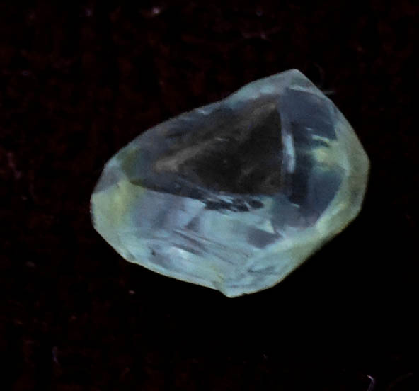 Photo below under shortwave ultraviolet illumination of Diamond (1.67 carat greenish-gray cuttable complex crystal) from Vaal River Mining District, Northern Cape Province, South Africa Diamond (1.67 carat greenish-gray cuttable complex crystal) from Vaal River Mining District, Northern Cape Province, South Africa