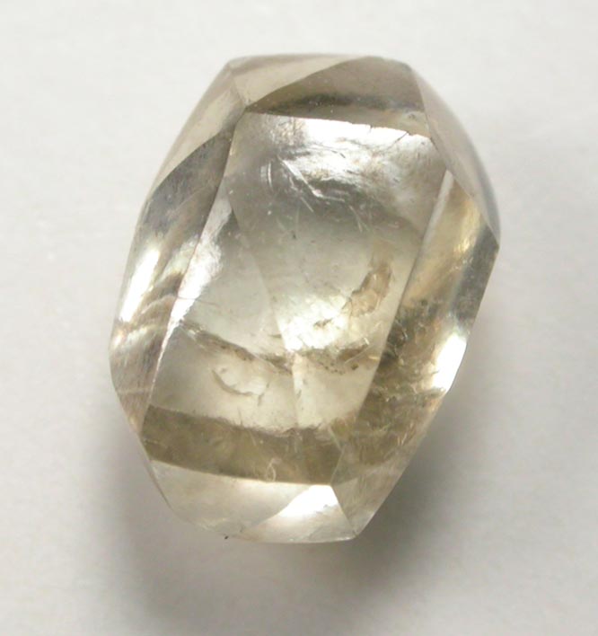 Diamond (1.34 carat yellow-gray cuttable elongated dodecahedral crystal) from Vaal River Mining District, Northern Cape Province, South Africa