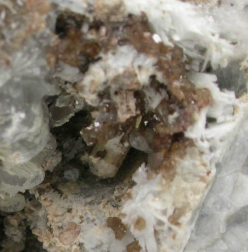 Remondite-(Ce) and Catapleiite from Poudrette Quarry, Mont Saint-Hilaire, Qubec, Canada