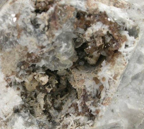 Remondite-(Ce) and Catapleiite from Poudrette Quarry, Mont Saint-Hilaire, Qubec, Canada