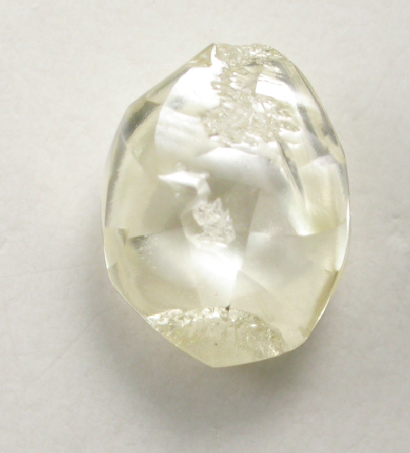 Diamond (0.84 carat yellow flattened crystal) from Argyle Mine, Kimberley, Western Australia, Australia