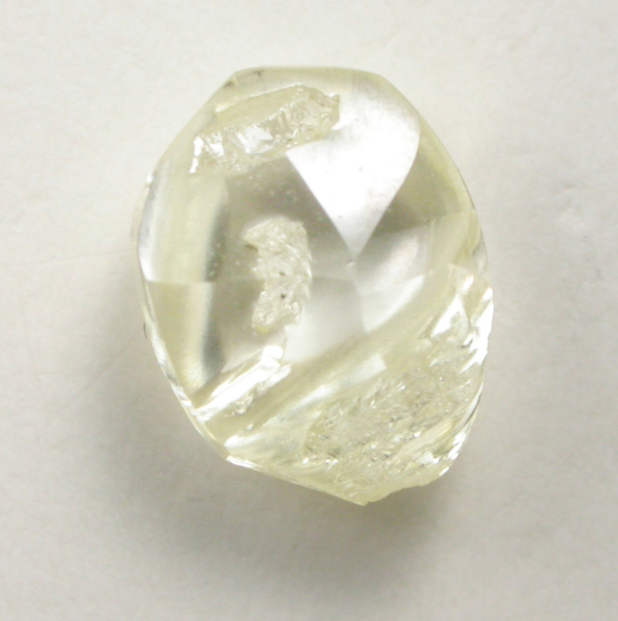 Diamond (0.84 carat yellow flattened crystal) from Argyle Mine, Kimberley, Western Australia, Australia