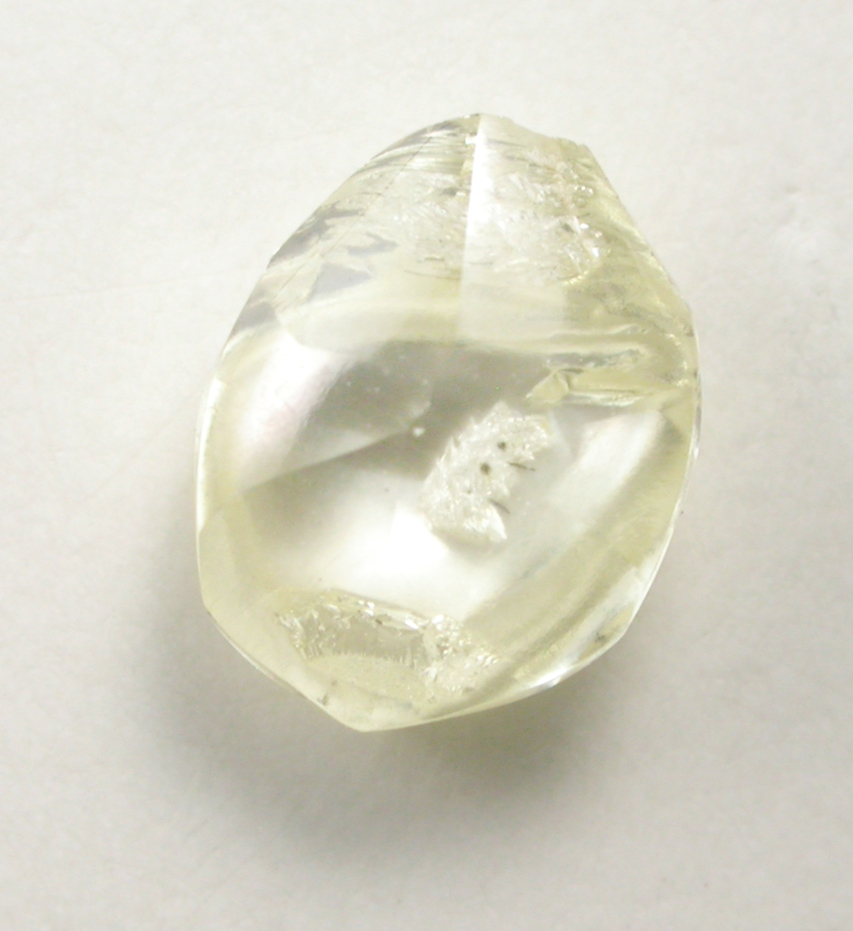 Diamond (0.84 carat yellow flattened crystal) from Argyle Mine, Kimberley, Western Australia, Australia