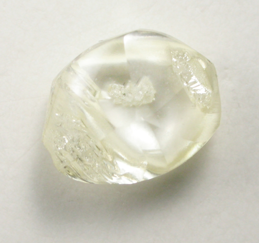 Diamond (0.84 carat yellow flattened crystal) from Argyle Mine, Kimberley, Western Australia, Australia