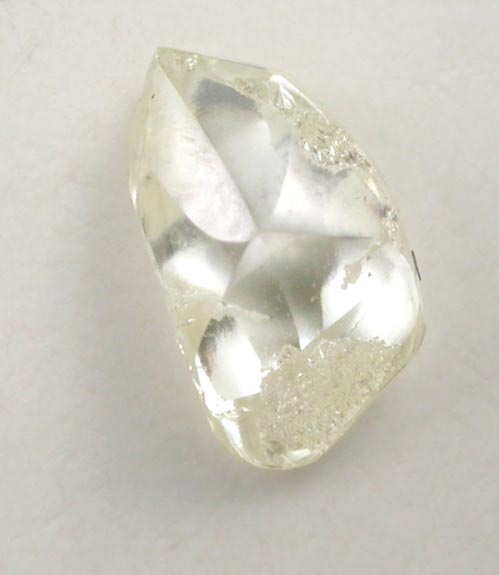 Diamond (0.56 carat pale-yellow flattened irregular crystal) from Argyle Mine, Kimberley, Western Australia, Australia