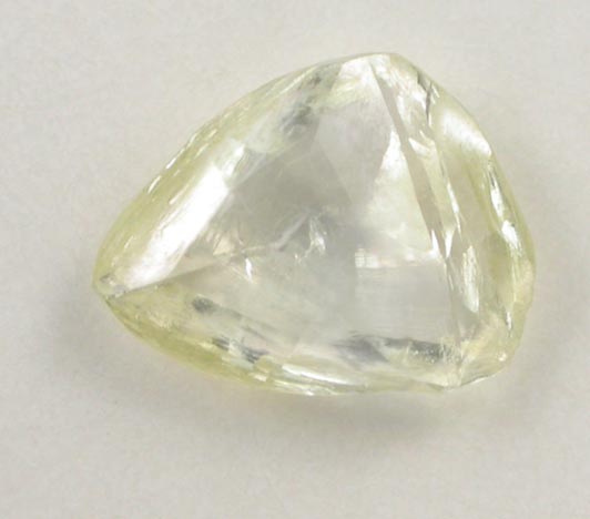 Diamond (0.42 carat yellow flattened triangular crystal) from Argyle Mine, Kimberley, Western Australia, Australia