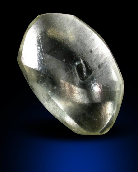 Diamond (0.68 carat pale-yellow flattened crystal) from Argyle Mine, Kimberley, Western Australia, Australia