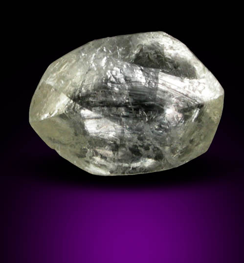 Diamond (0.42 carat pale-yellow flattened tetrahexahedral crystal) from Argyle Mine, Kimberley, Western Australia, Australia