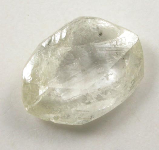 Diamond (0.42 carat pale-yellow flattened tetrahexahedral crystal) from Argyle Mine, Kimberley, Western Australia, Australia