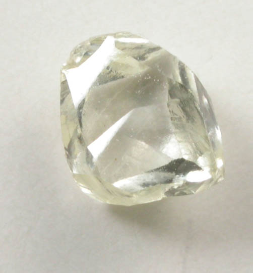 Diamond (0.37 carat pale-yellow flattened irregular crystal) from Argyle Mine, Kimberley, Western Australia, Australia