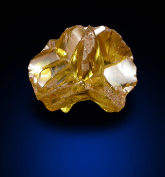 Diamond (0.31 carat fancy intense-yellow cavernous crystal) from Mbuji-Mayi (Miba), 300 km east of Tshikapa, Democratic Republic of the Congo