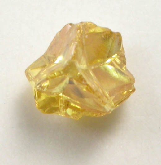Diamond (0.11 carat fancy intense-yellow cavernous crystal) from Mbuji-Mayi (Miba), 300 km east of Tshikapa, Democratic Republic of the Congo
