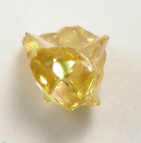 Diamond (0.11 carat fancy intense-yellow cavernous crystal) from Mbuji-Mayi (Miba), 300 km east of Tshikapa, Democratic Republic of the Congo