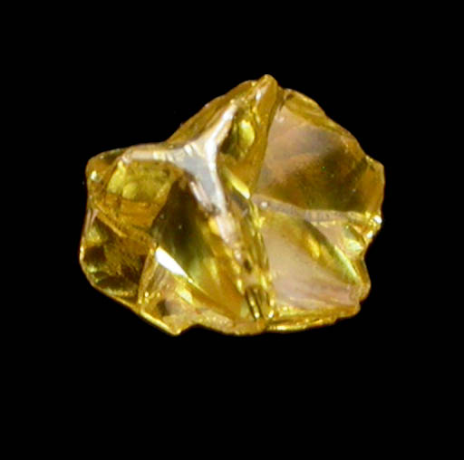 Diamond (0.11 carat fancy intense-yellow cavernous crystal) from Mbuji-Mayi (Miba), 300 km east of Tshikapa, Democratic Republic of the Congo