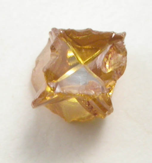 Diamond (0.19 carat fancy intense-yellow-brown cavernous crystal) from Mbuji-Mayi (Miba), 300 km east of Tshikapa, Democratic Republic of the Congo