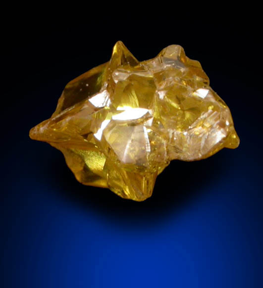 Diamond (0.24 carat intergrown fancy intense-yellow cavernous crystals) from Mbuji-Mayi (Miba), 300 km east of Tshikapa, Democratic Republic of the Congo