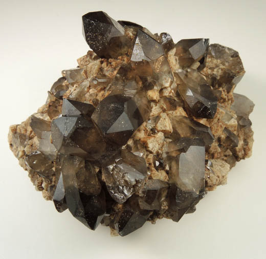 Quartz var. Smoky Quartz (Dauphin-law twins) on Microcline from Moat Mountain, west of North Conway, Carroll County, New Hampshire