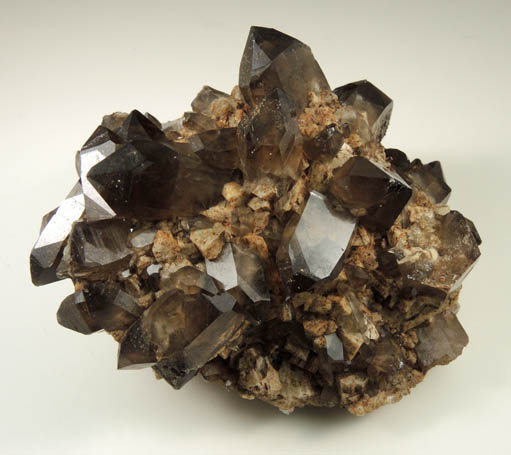 Quartz var. Smoky Quartz (Dauphin-law twins) on Microcline from Moat Mountain, west of North Conway, Carroll County, New Hampshire